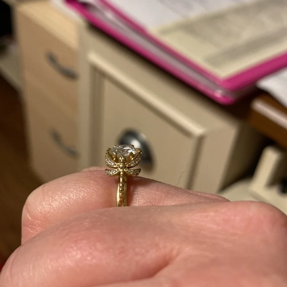 10kt yellow gold and moissanite dragonfly ring.